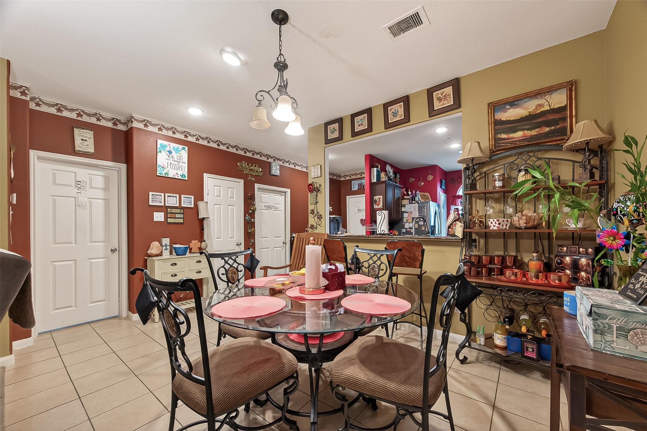 1019 Arnica Street Baytown, TX 77521 - Photo 10 of 16 a view of a dining room with furniture