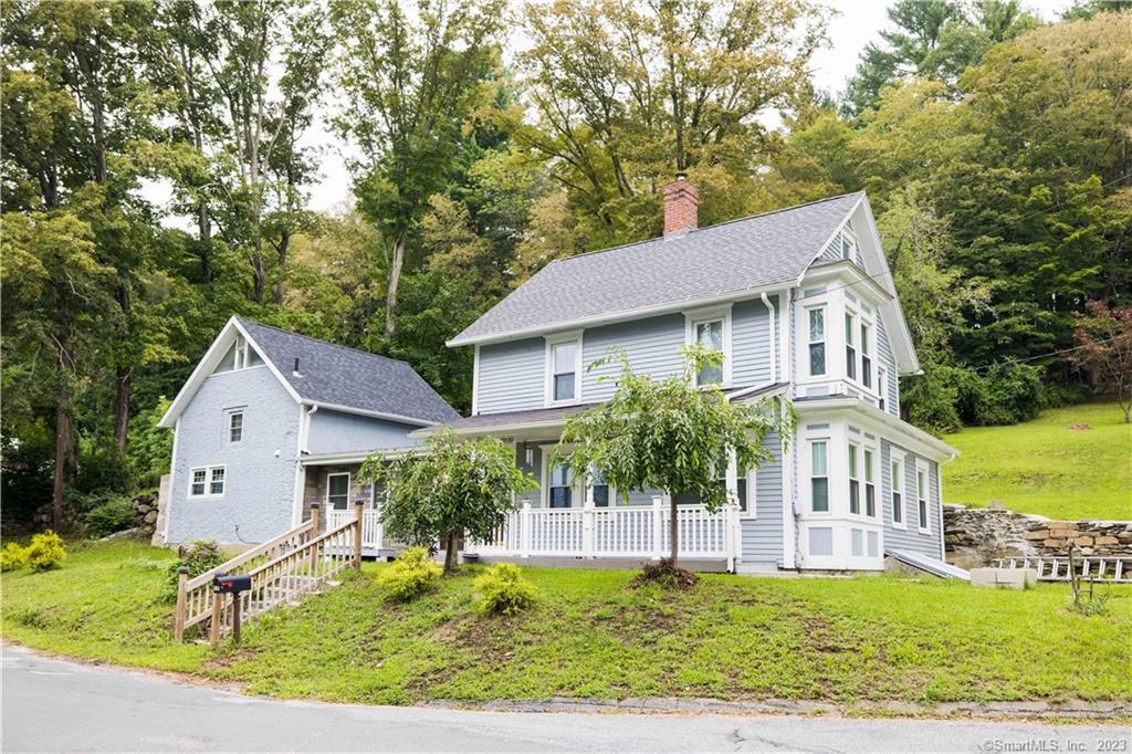 2 Codfish Falls Road Mansfield, CT 06268 - Photo 1 of 1 a front view of a house with a yard