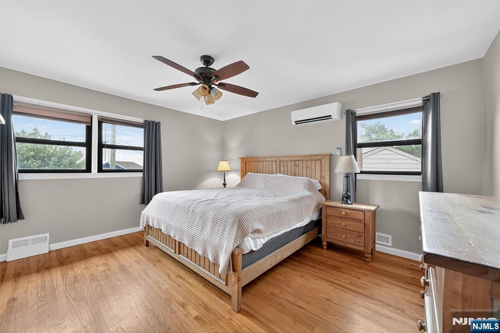 7 Faber Place Nutley, NJ 07110 - Photo 16 of 41 a bedroom with a bed and window