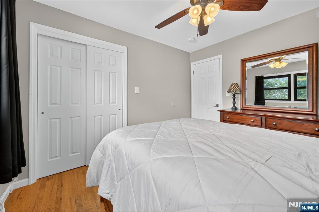 7 Faber Place Nutley, NJ 07110 - Photo 20 of 41 a bed room with a bed and a large window