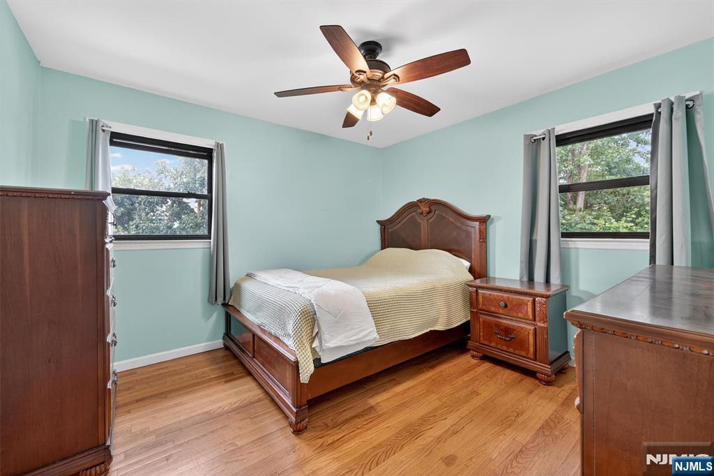 7 Faber Place Nutley, NJ 07110 - Photo 22 of 41 a bedroom with a large bed and a window