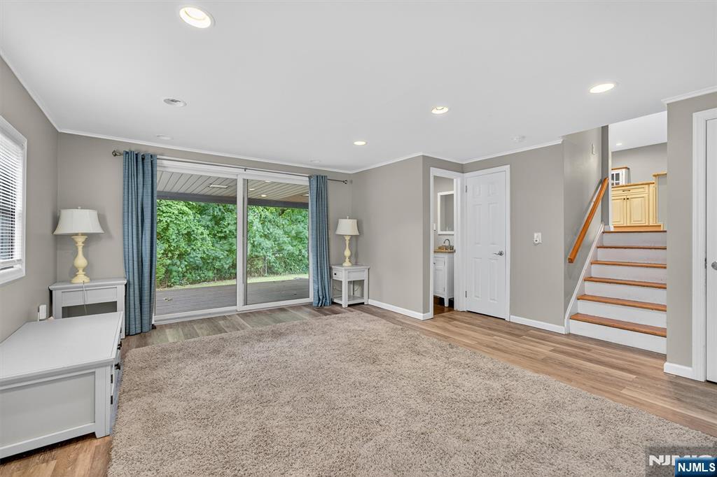 7 Faber Place Nutley, NJ 07110 - Photo 24 of 41 a view of empty room with wooden floor and fan