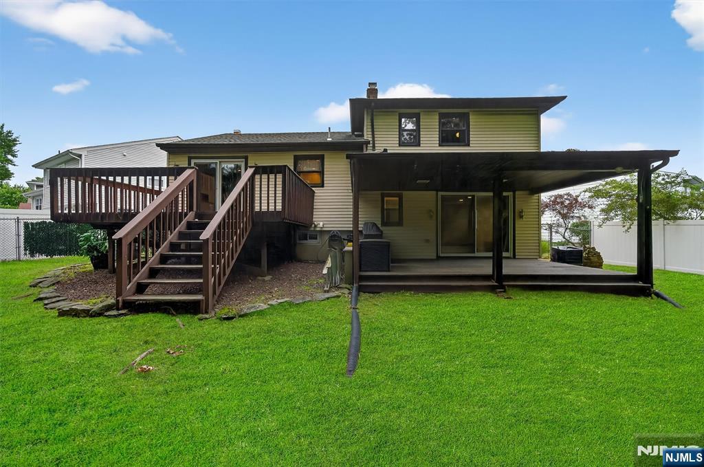 7 Faber Place Nutley, NJ 07110 - Photo 33 of 41 a front view of a house with garden