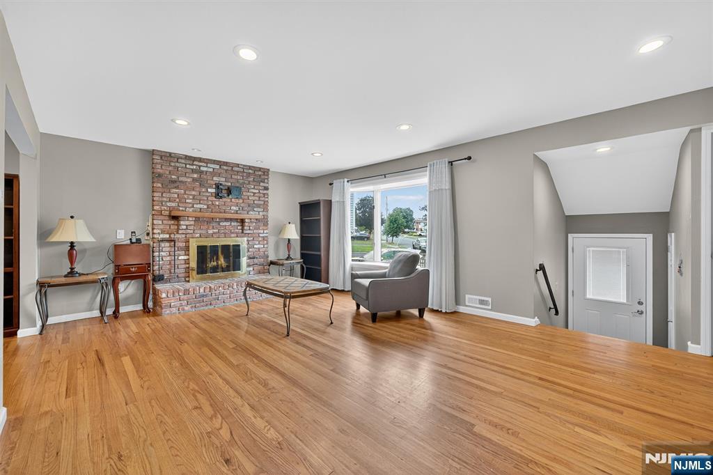 7 Faber Place Nutley, NJ 07110 - Photo 5 of 41 a living room with furniture and a fireplace