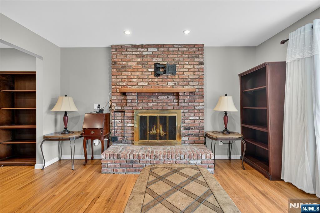 7 Faber Place Nutley, NJ 07110 - Photo 7 of 41 a living room with furniture and a fireplace