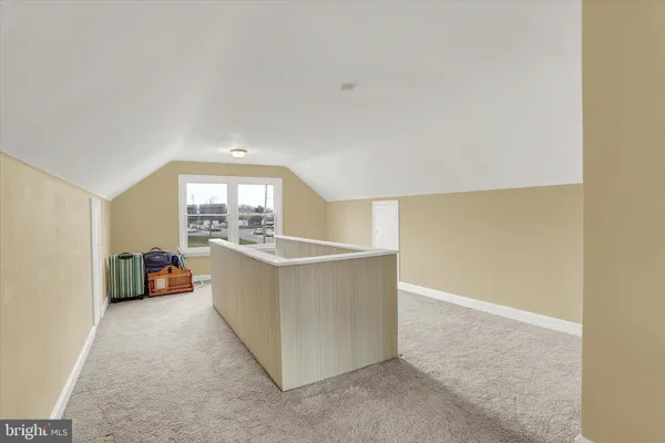 a view of kitchen with furniture and window