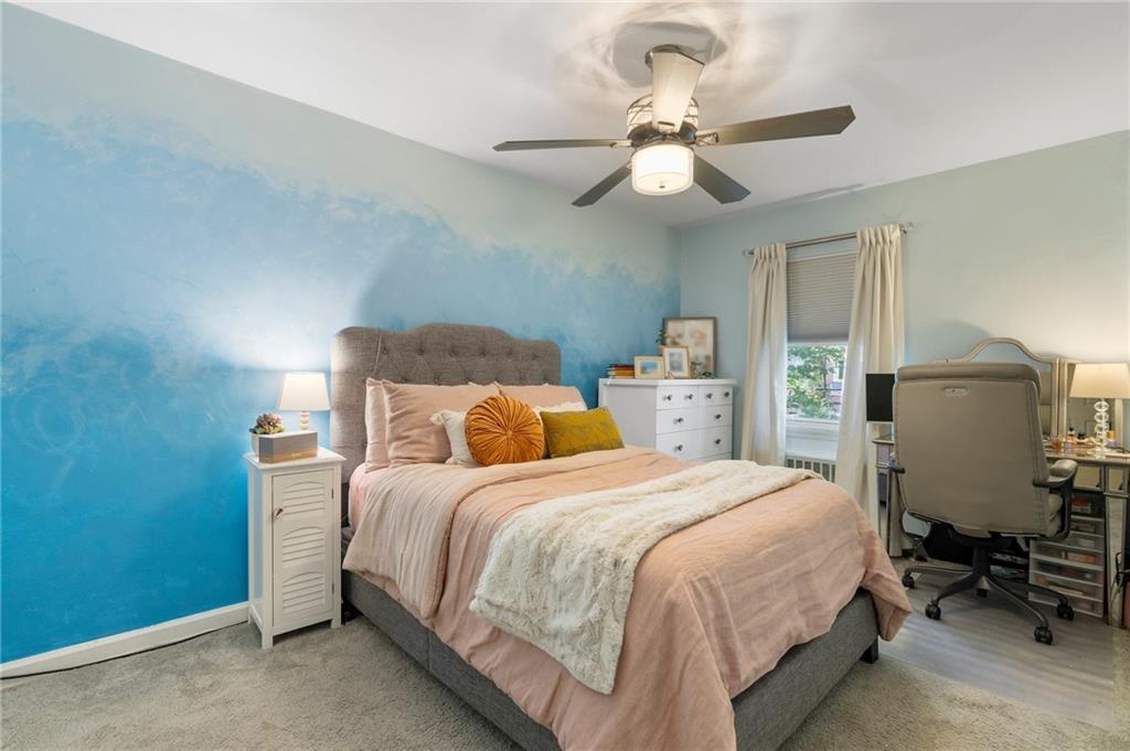 2472 Stuart Street Brooklyn, NY 11229 - Photo 15 of 28 a bedroom with a bed and furniture