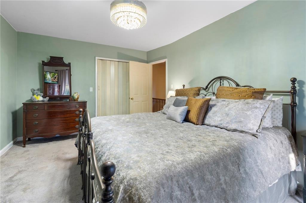 2472 Stuart Street Brooklyn, NY 11229 - Photo 17 of 28 a bedroom with a bed and a dresser