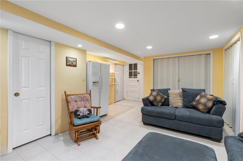 2472 Stuart Street Brooklyn, NY 11229 - Photo 22 of 28 a living room with furniture