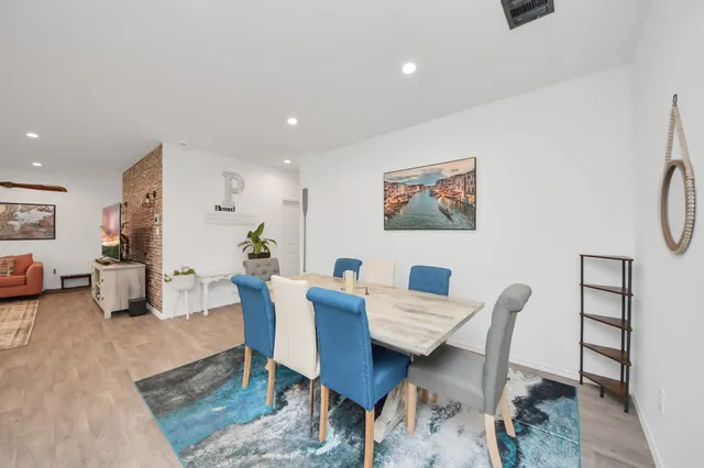 a view of a dining room with furniture