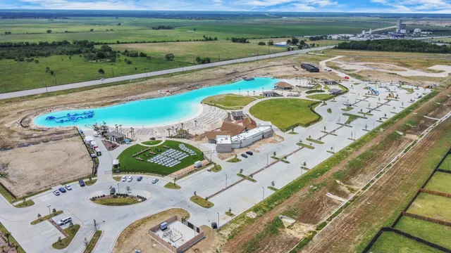 a view of a swimming pool with a patio