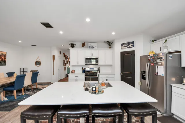 a view of a dining room with furniture