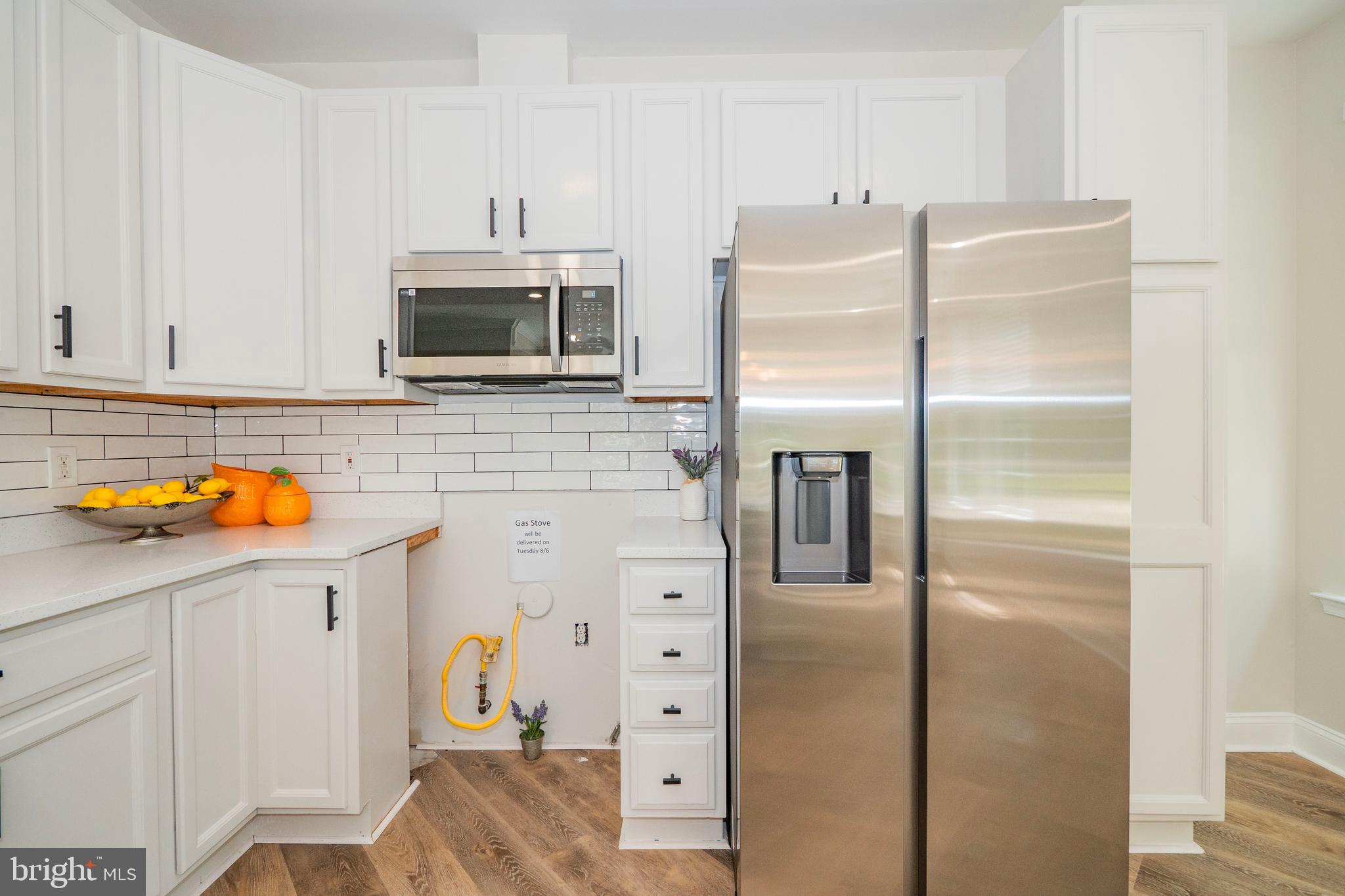 5801 Clipper Lane, Unit 102 Clarksville, MD 21029 - Photo 25 of 37 A gas oven will be delivered on 8/6 Tuesday.