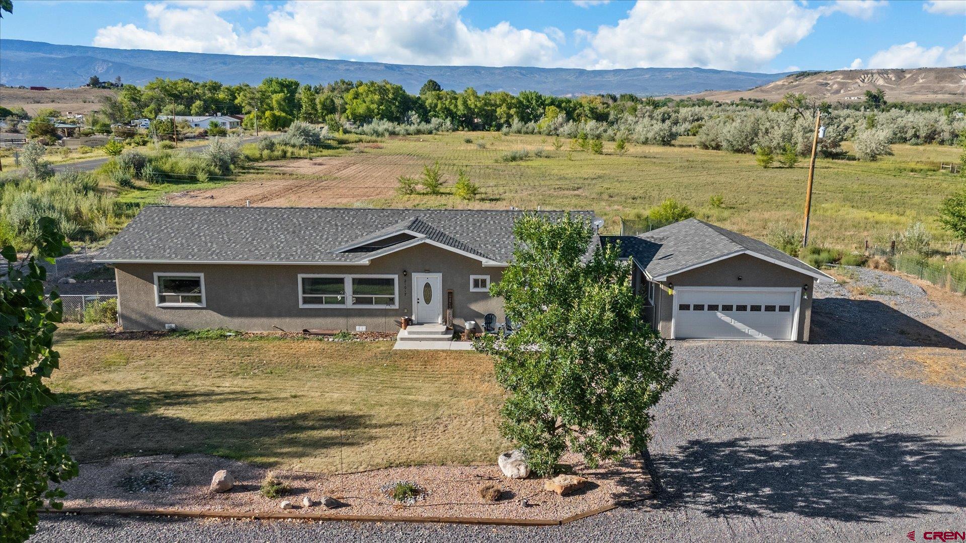 a view of a house with a lake view