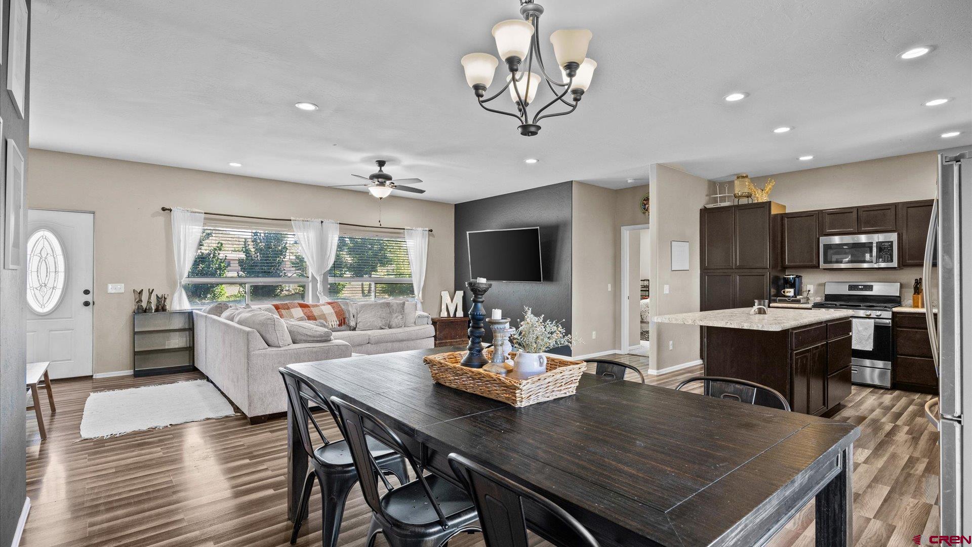 21017 Austin Road Austin, CO 81410 - Photo 12 of 29 a view of a dining room with furniture window and outside view