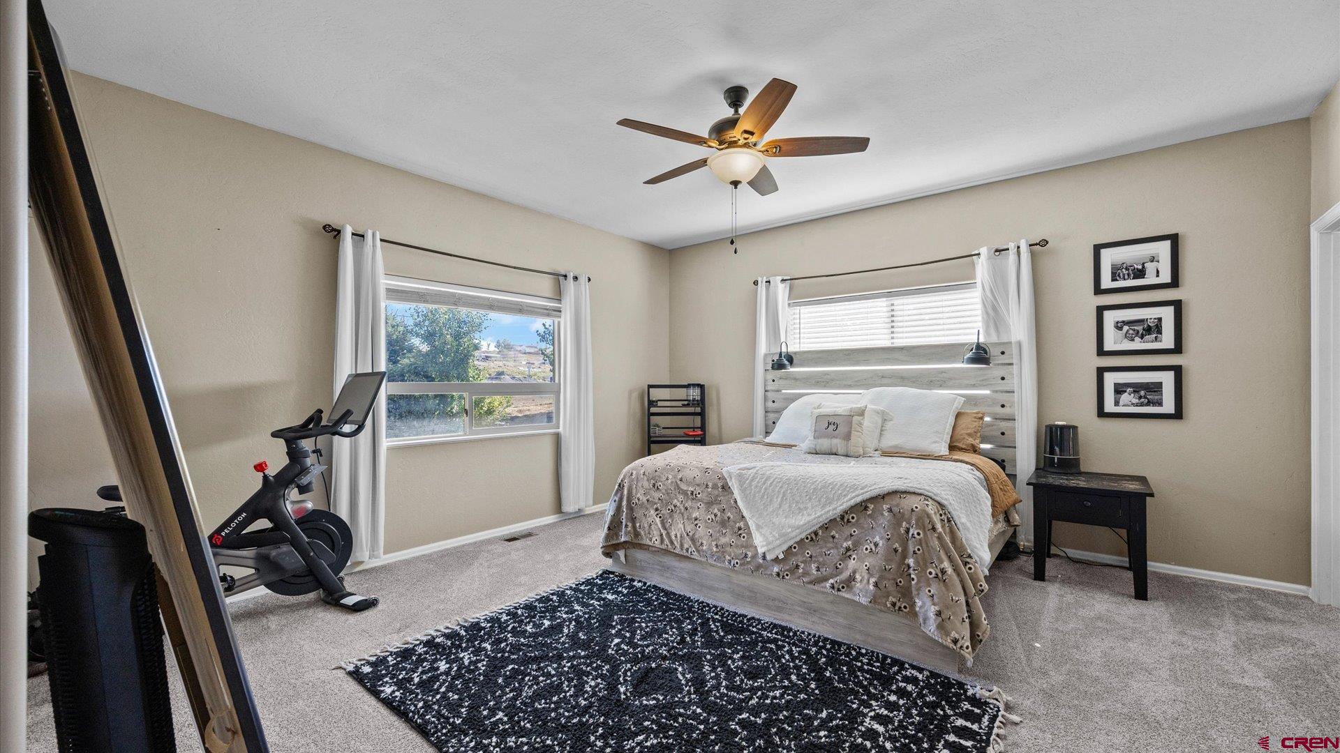 21017 Austin Road Austin, CO 81410 - Photo 13 of 29 a bedroom with a bed and a window