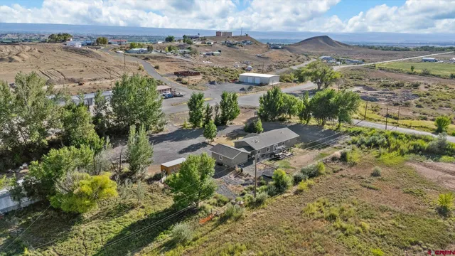 an aerial view of residential house with outdoor space