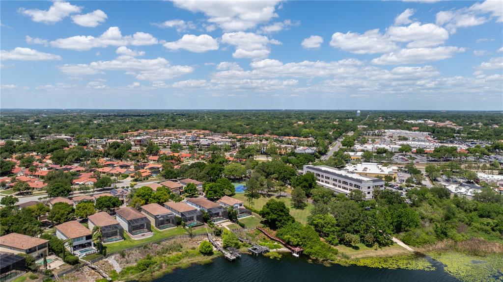 8119 Vía Rosa Orlando, FL 32836 - Photo 51 of 62 an aerial view of residential building with green space