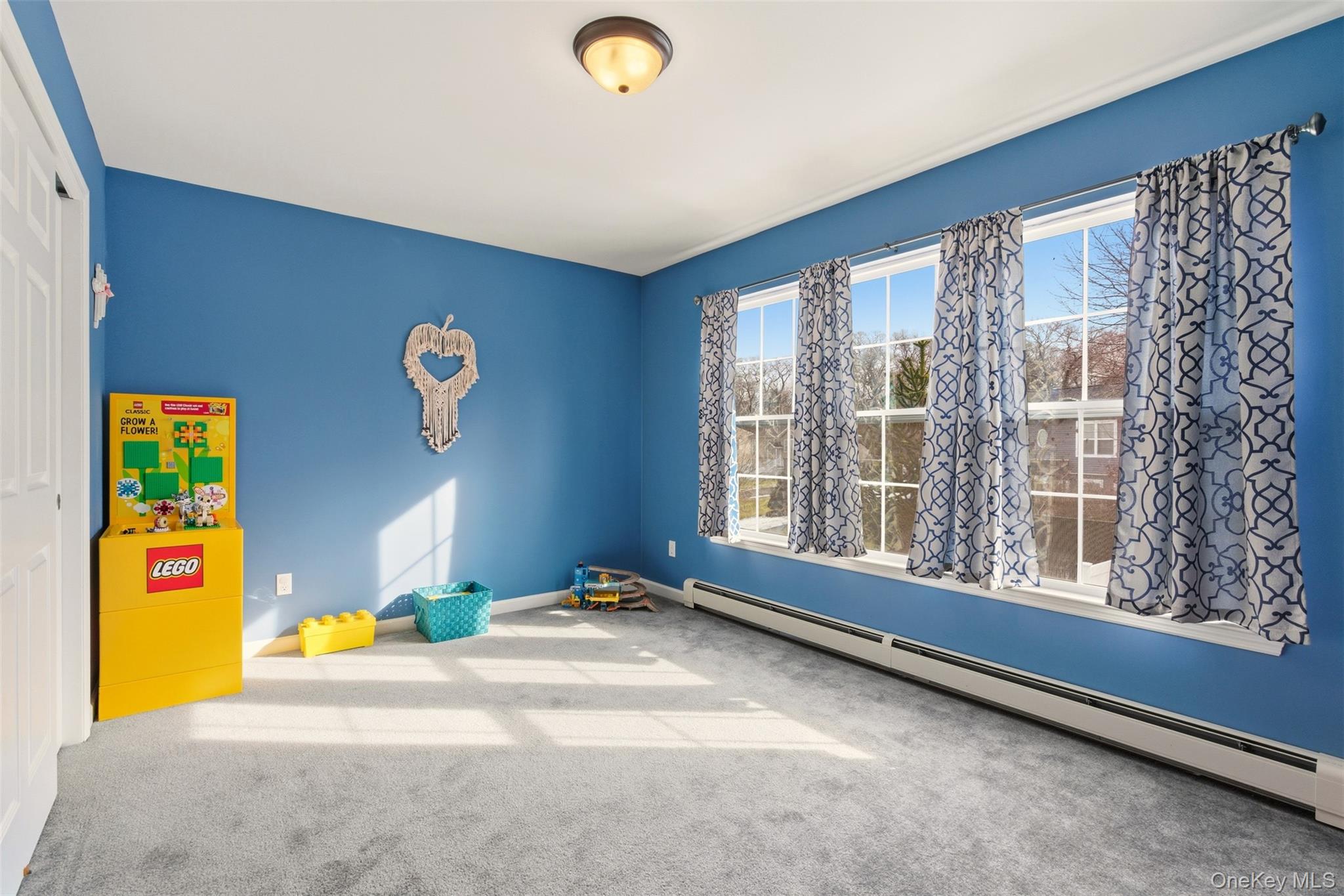 4 Macintosh Lane Selden, NY 11784 - Photo 13 of 30 a view of an empty room with a window