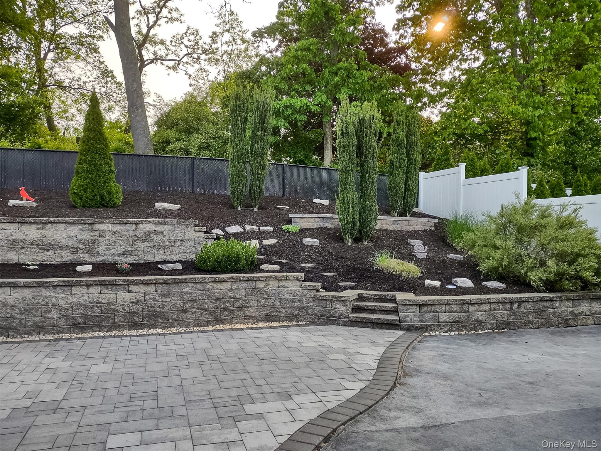 4 Macintosh Lane Selden, NY 11784 - Photo 17 of 30 a backyard of a house with lots of green space