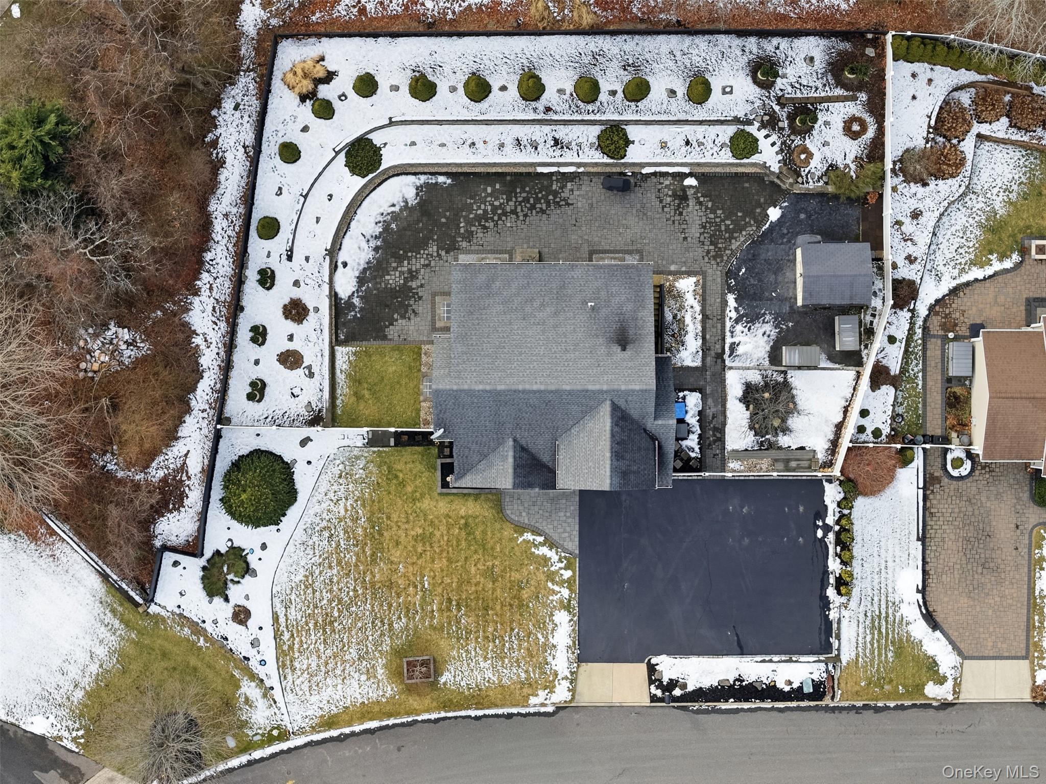 4 Macintosh Lane Selden, NY 11784 - Photo 23 of 30 an aerial view of a fireplace with furniture