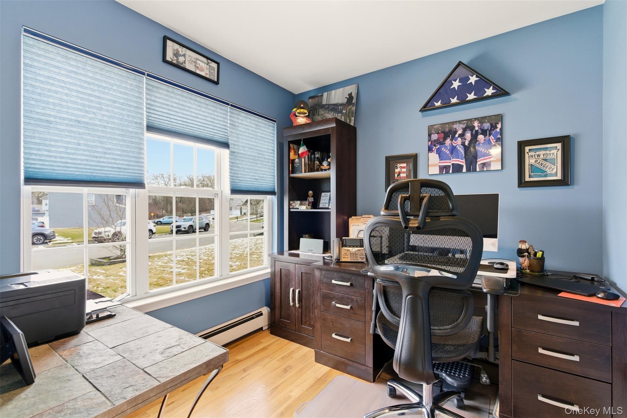 4 Macintosh Lane Selden, NY 11784 - Photo 8 of 30 a view of a workspace with furniture and a window