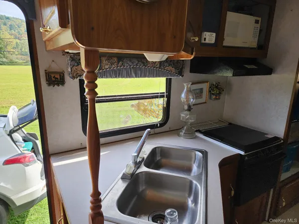 a view of a hallway with two elevator