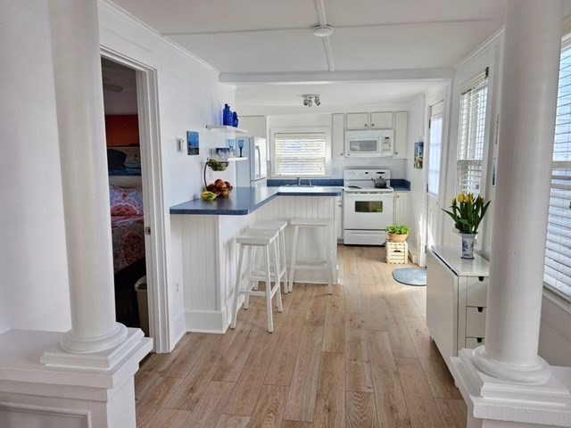 7 Pleasant Street Wareham, MA 02571 - Photo 8 of 19 a living room with furniture and a wooden floor