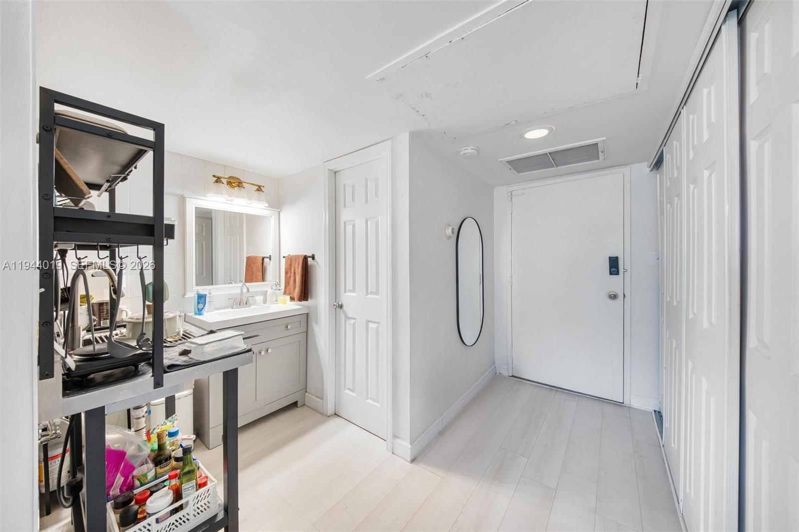 11111 Biscayne Boulevard, Unit 2D Miami, FL 33181 - Photo 24 of 26 a view of a storage & utility room with stuff