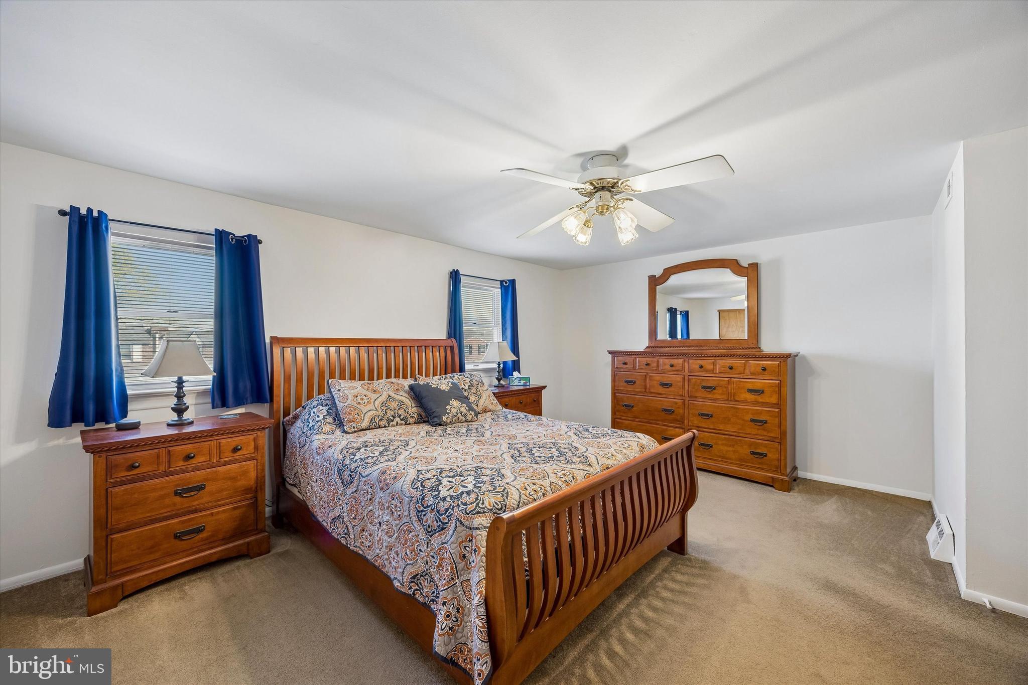 3212 Atmore Road Philadelphia, PA 19154 - Photo 14 of 25 a bedroom with bed and a chandelier