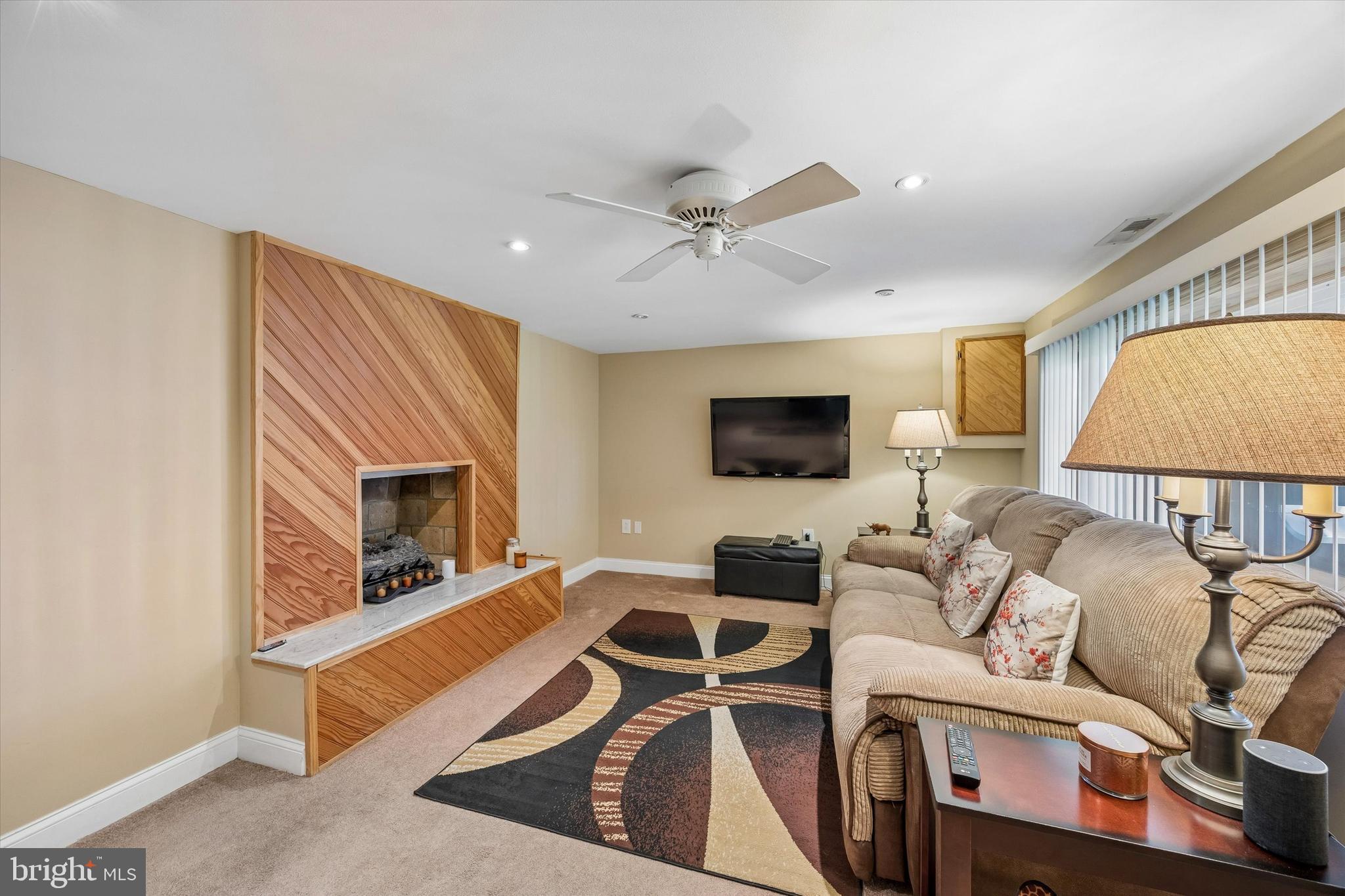 3212 Atmore Road Philadelphia, PA 19154 - Photo 18 of 25 a living room with furniture and a flat screen tv
