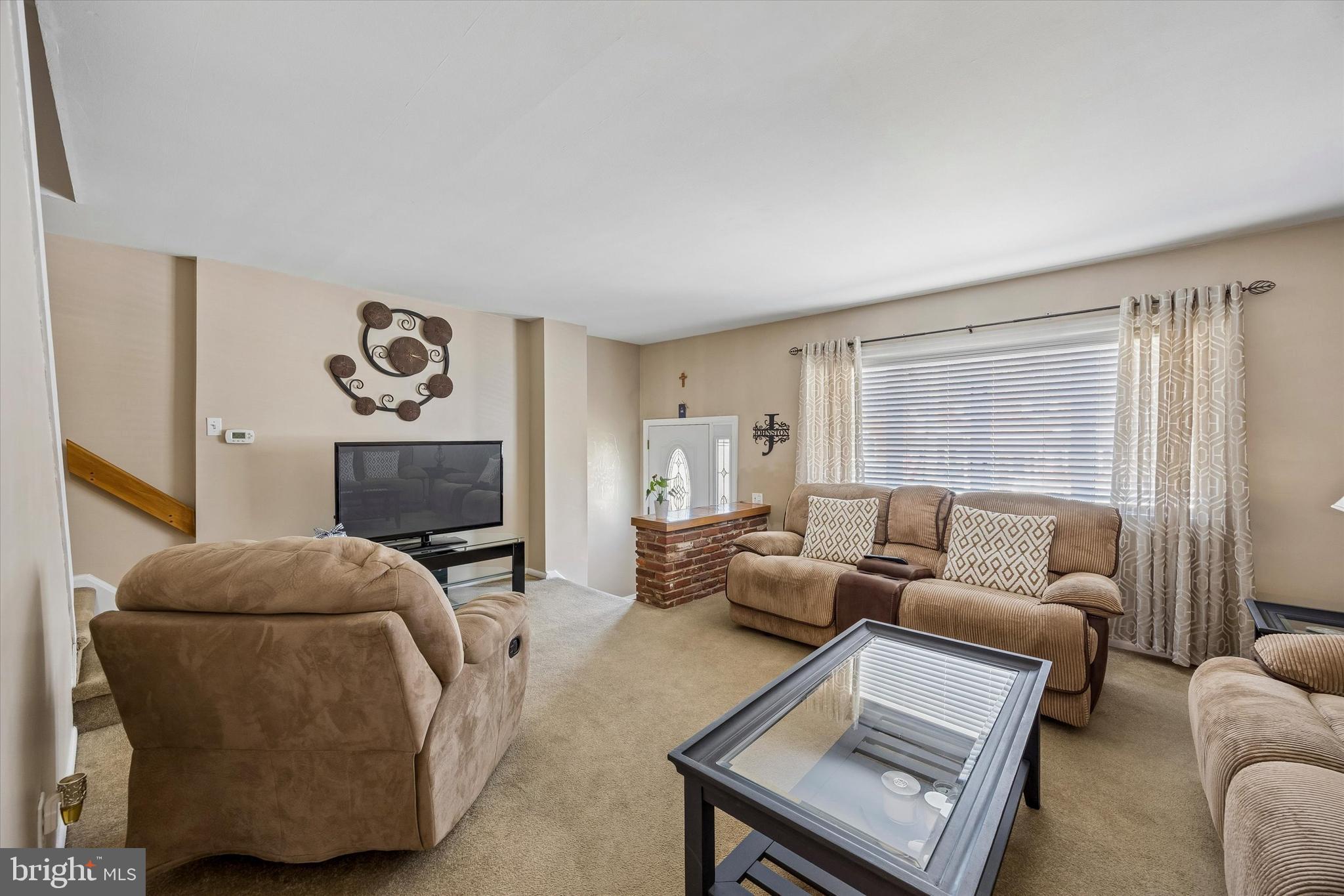 3212 Atmore Road Philadelphia, PA 19154 - Photo 6 of 25 a living room with furniture and a window