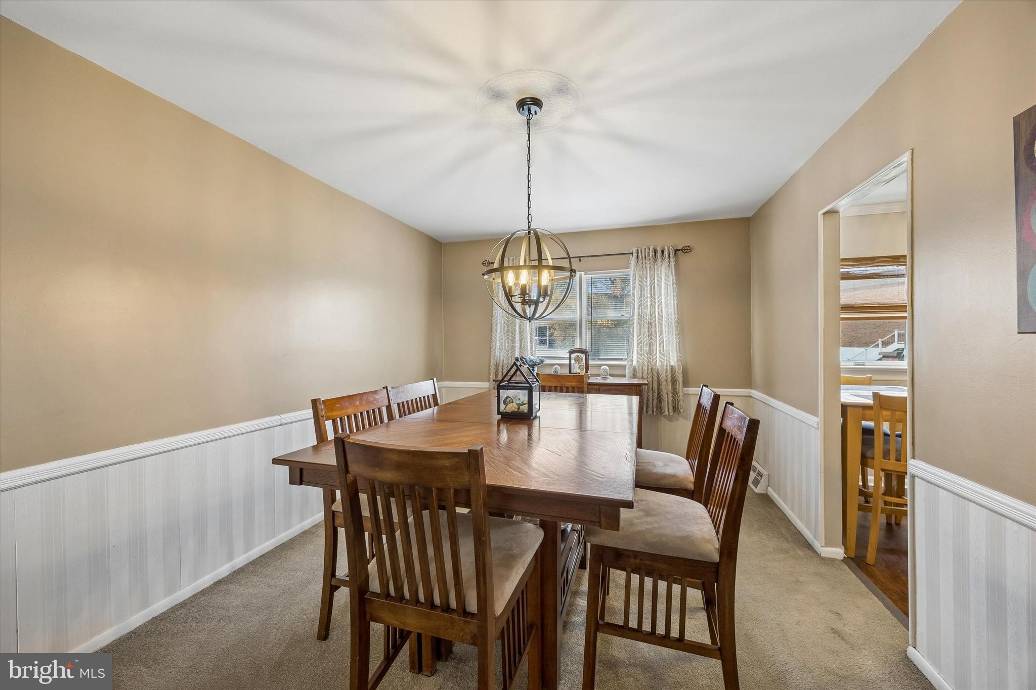 3212 Atmore Road Philadelphia, PA 19154 - Photo 8 of 25 a view of a dining room with furniture window and wooden floor