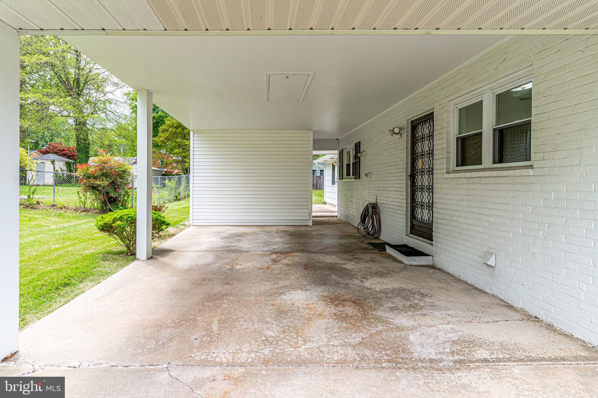 5403 Fremont Street Springfield, VA 22151 - Photo 23 of 25 Large oversized carport with storage shed.