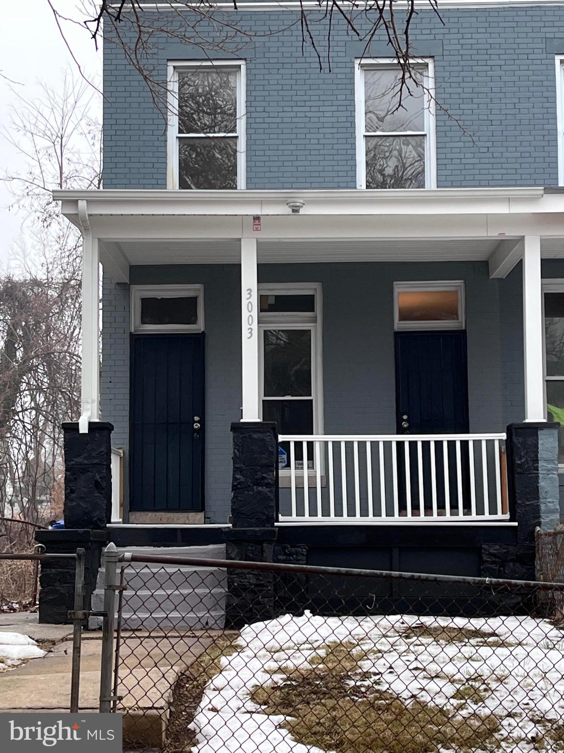 a view of a brick house with a window