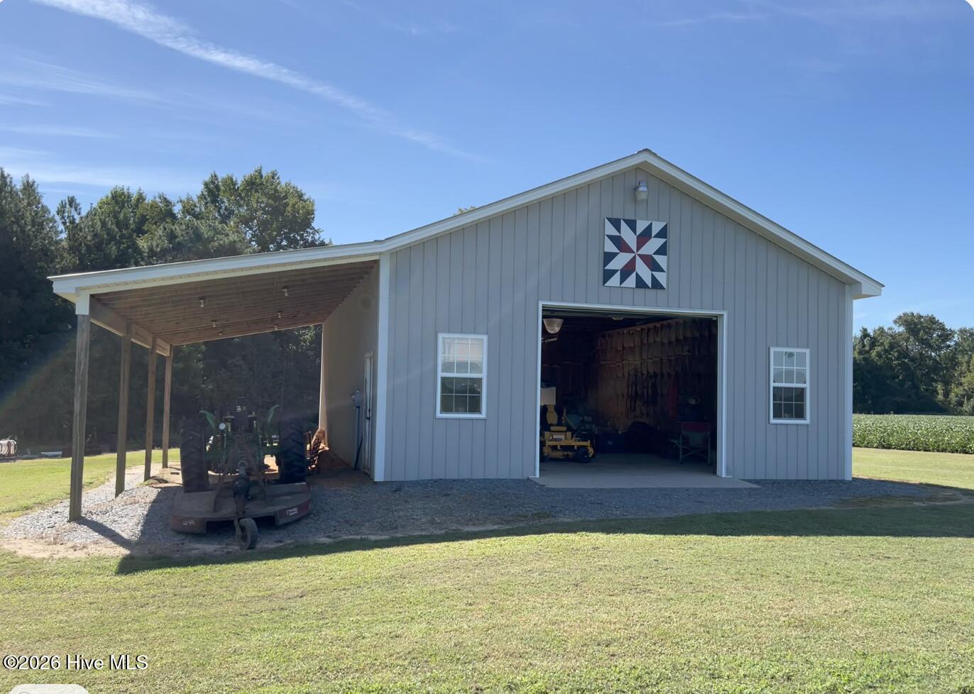 642 Enoch Road Clinton, NC 28328 - Photo 23 of 72 30 X 40 Detached workshop with 15 X 40 Shelter.