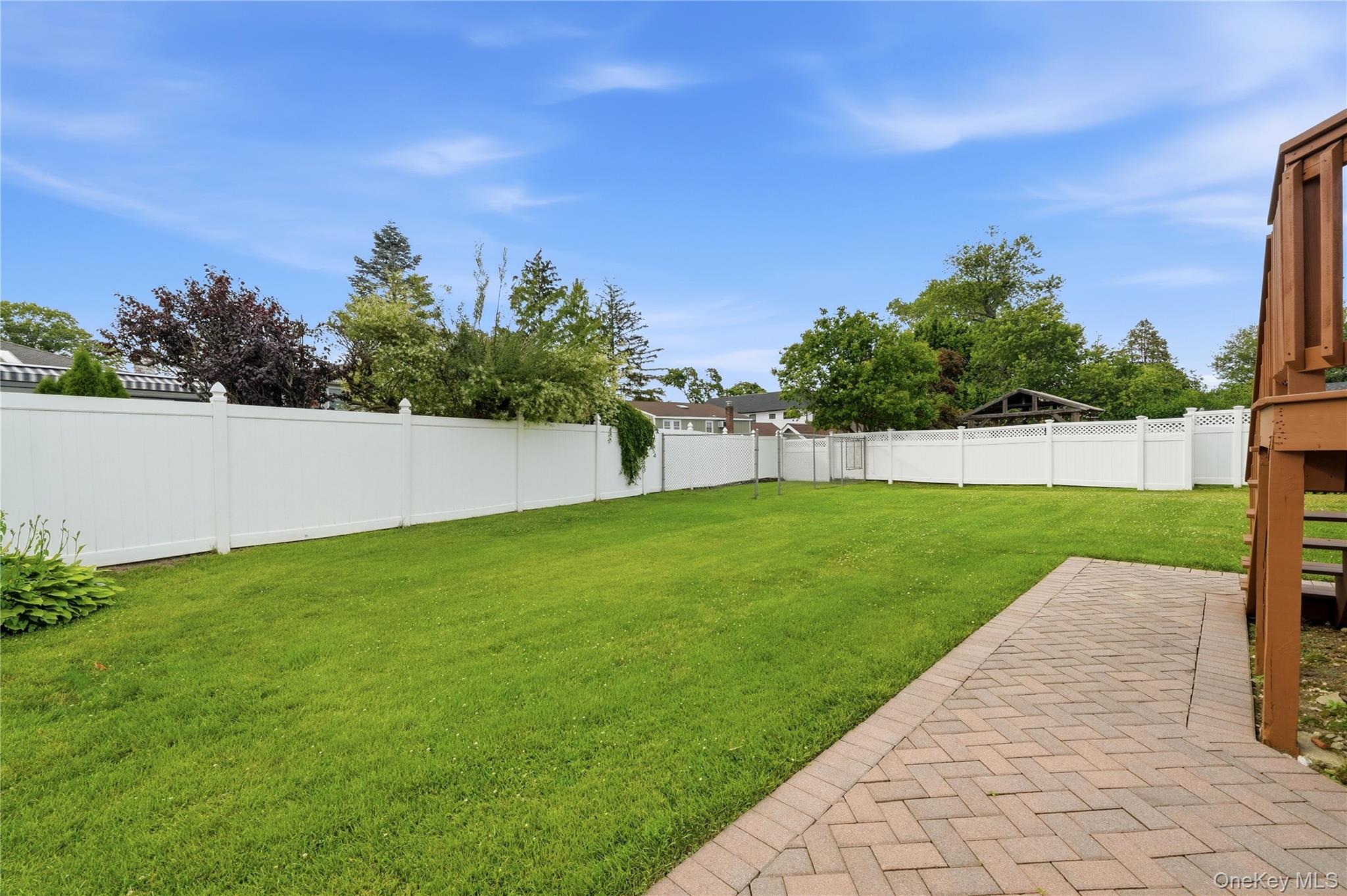 1853 Decatur Avenue Merrick, NY 11566 - Photo 36 of 43 a view of yard with green space