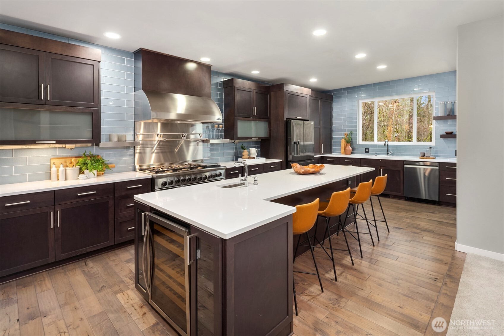 5819 Northeast 1st Street Renton, WA 98059 - Photo 12 of 38 a kitchen with a sink appliances and cabinets