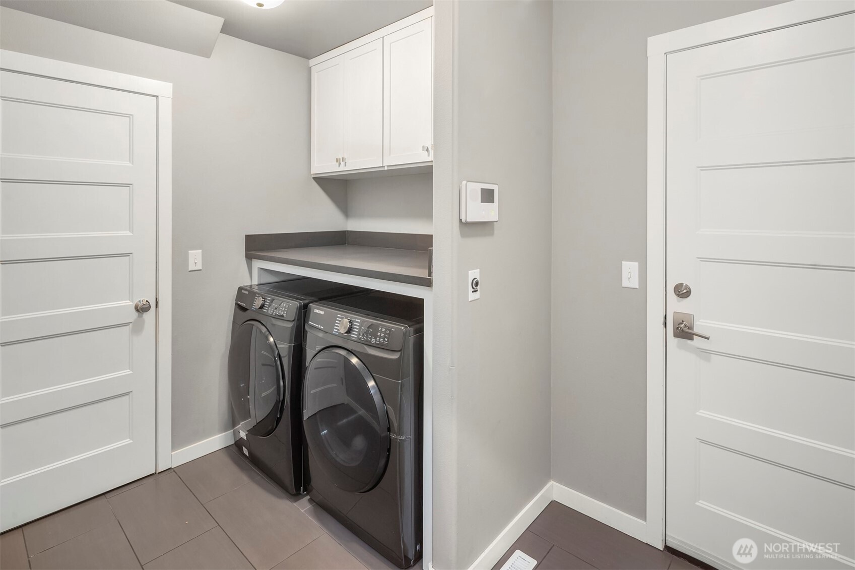 5819 Northeast 1st Street Renton, WA 98059 - Photo 21 of 38 a utility room with washing machine