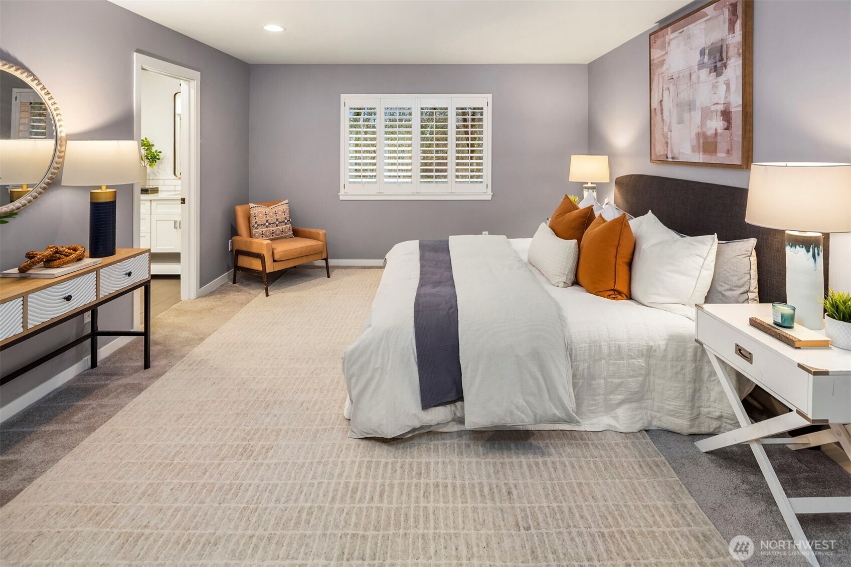 5819 Northeast 1st Street Renton, WA 98059 - Photo 23 of 38 a bed room with a bed and a lamp