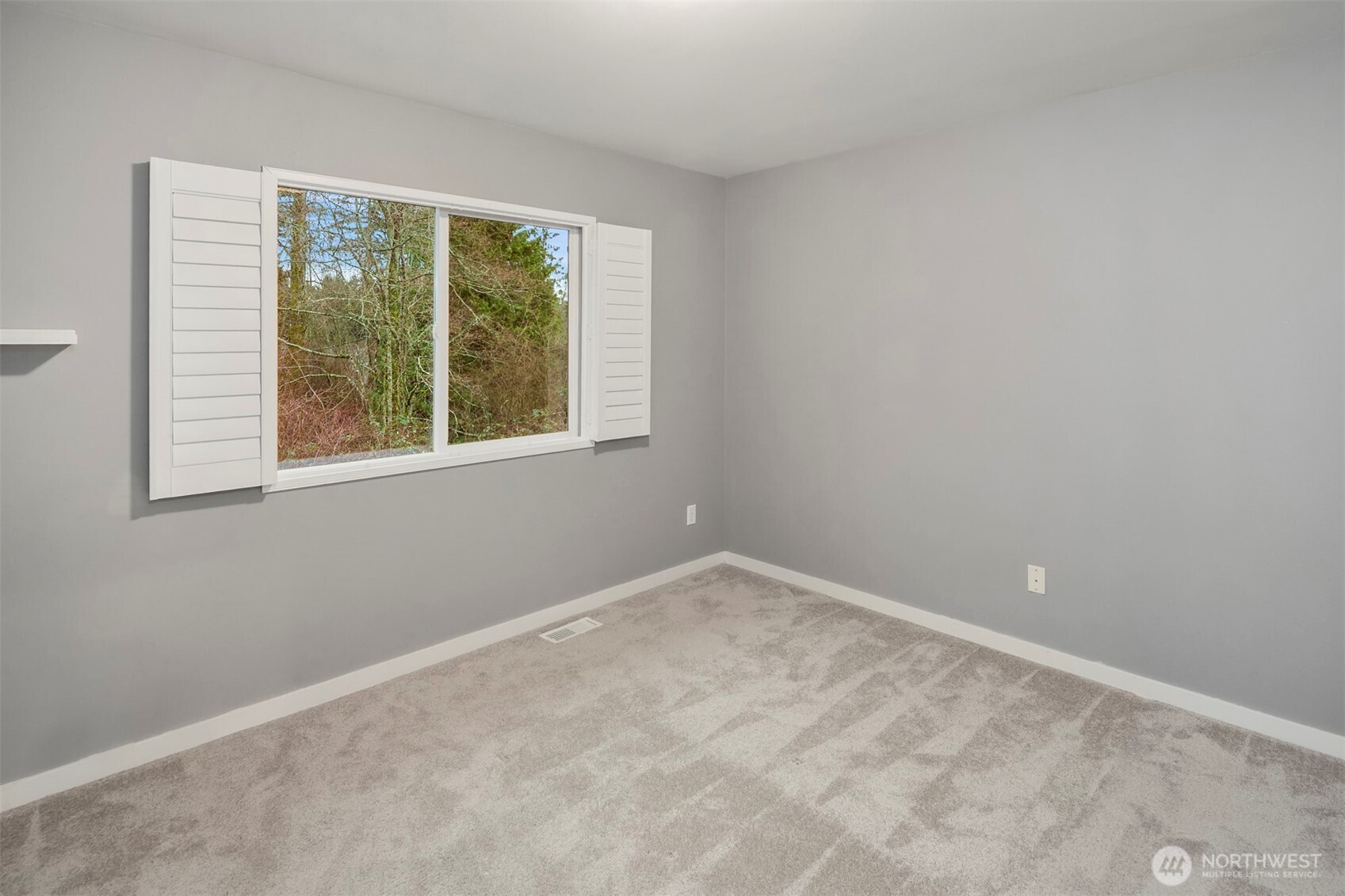 5819 Northeast 1st Street Renton, WA 98059 - Photo 30 of 38 a view of an empty room with a window
