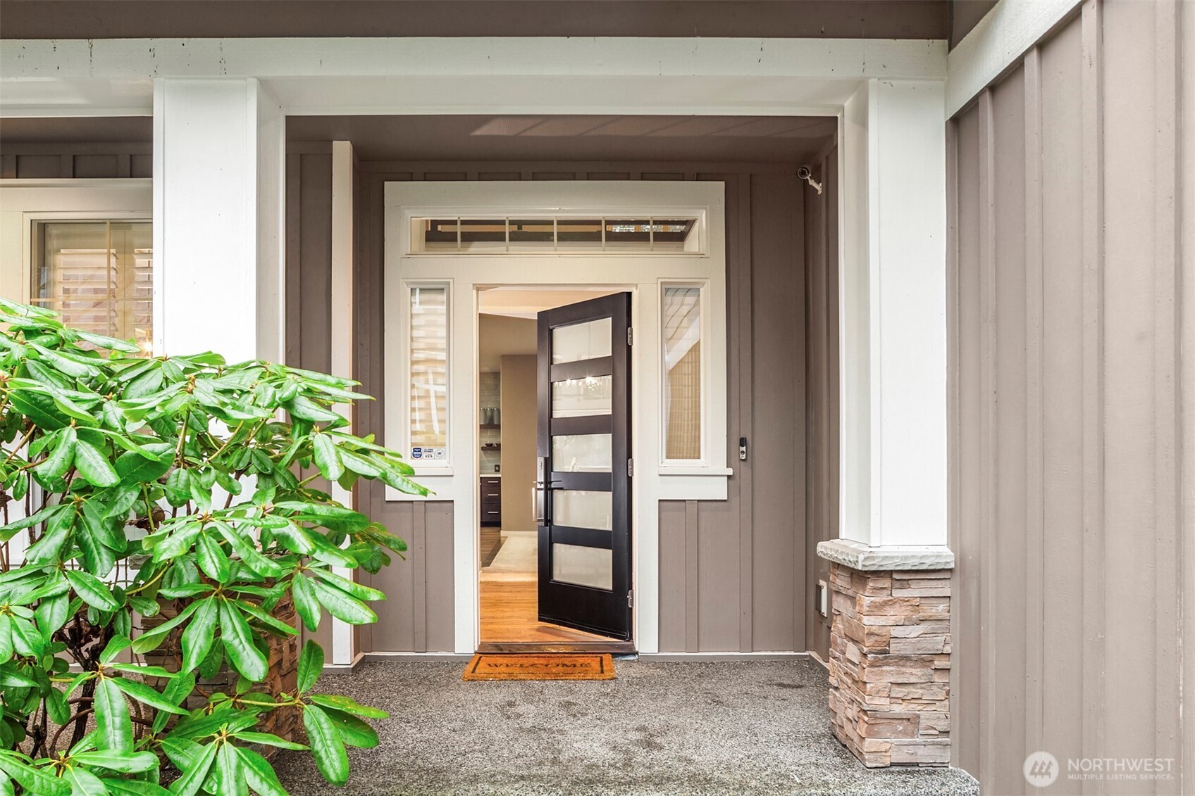 5819 Northeast 1st Street Renton, WA 98059 - Photo 3 of 38 a view of a front door of the house