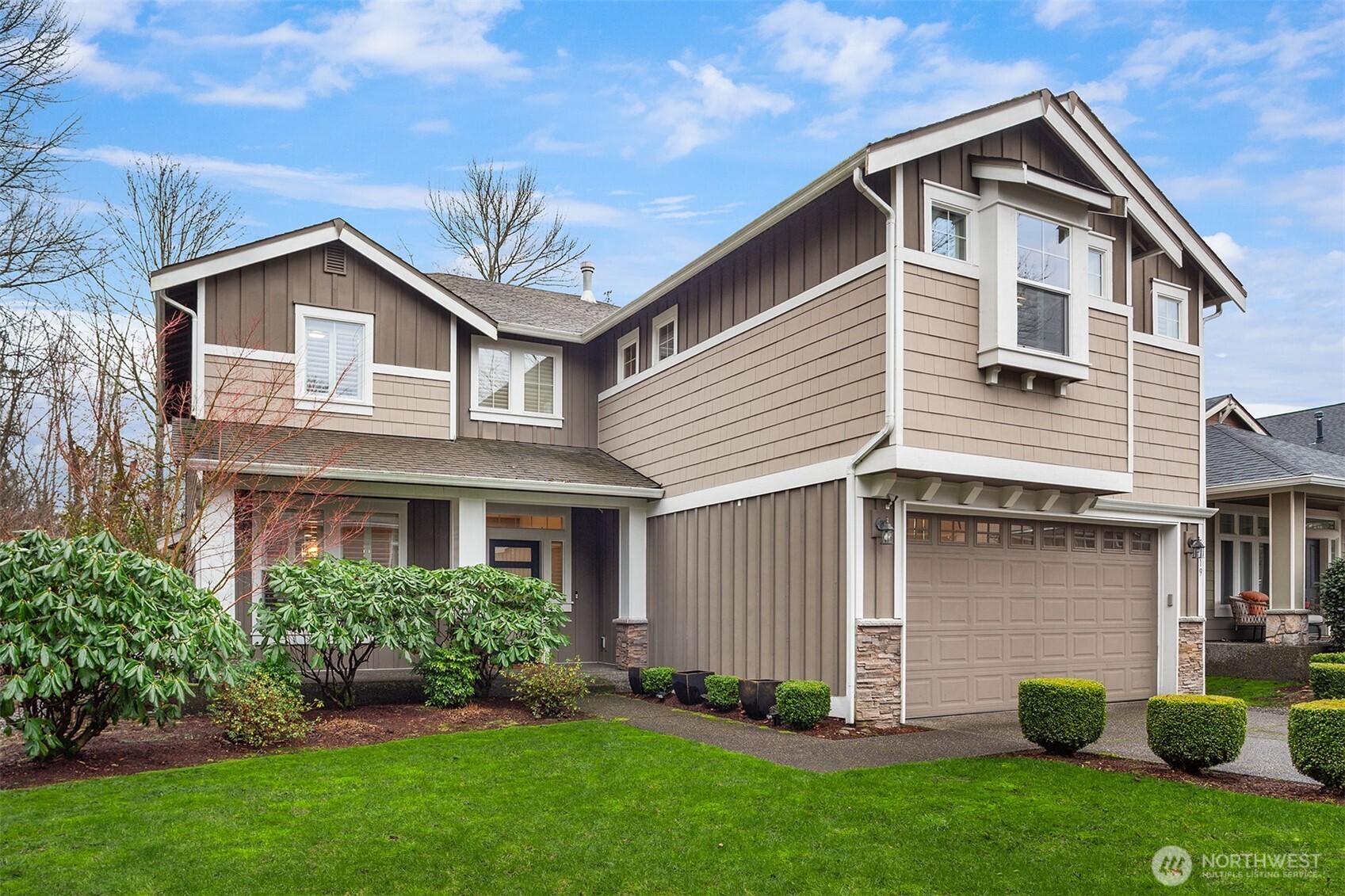 5819 Northeast 1st Street Renton, WA 98059 - Photo 37 of 38 a view of a yard in front view of a house and garage