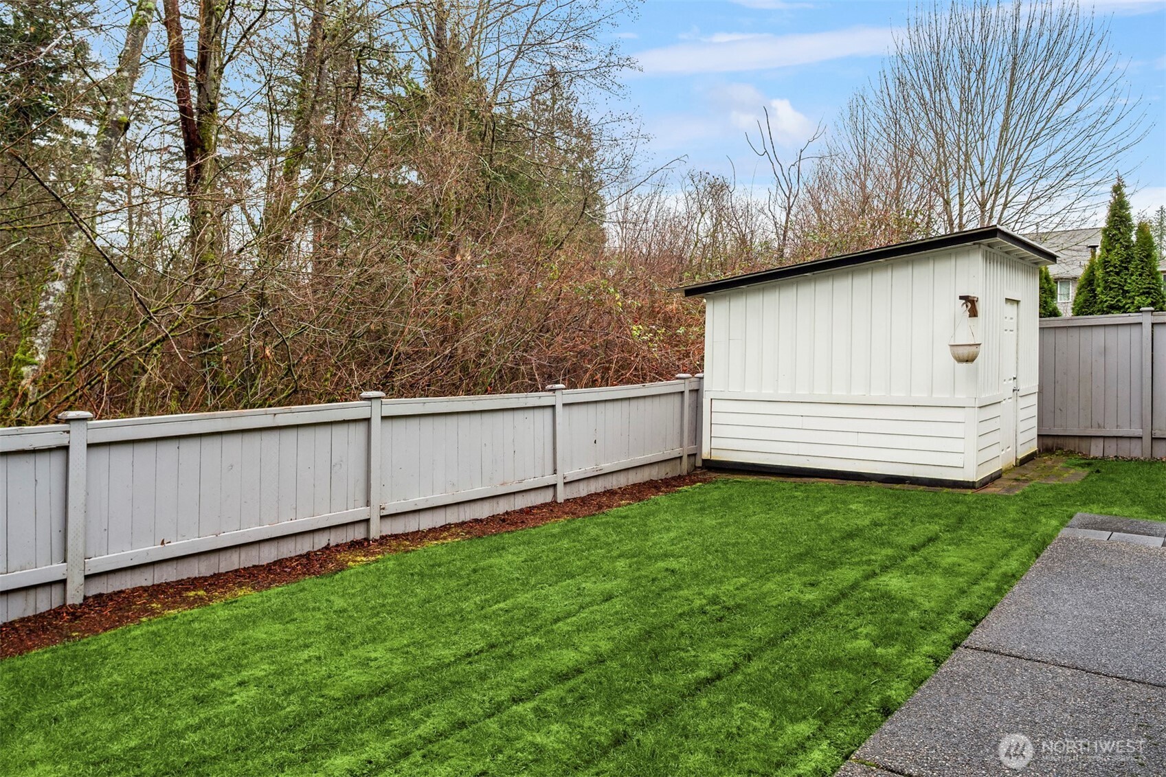5819 Northeast 1st Street Renton, WA 98059 - Photo 38 of 38 a view of a backyard with a garden