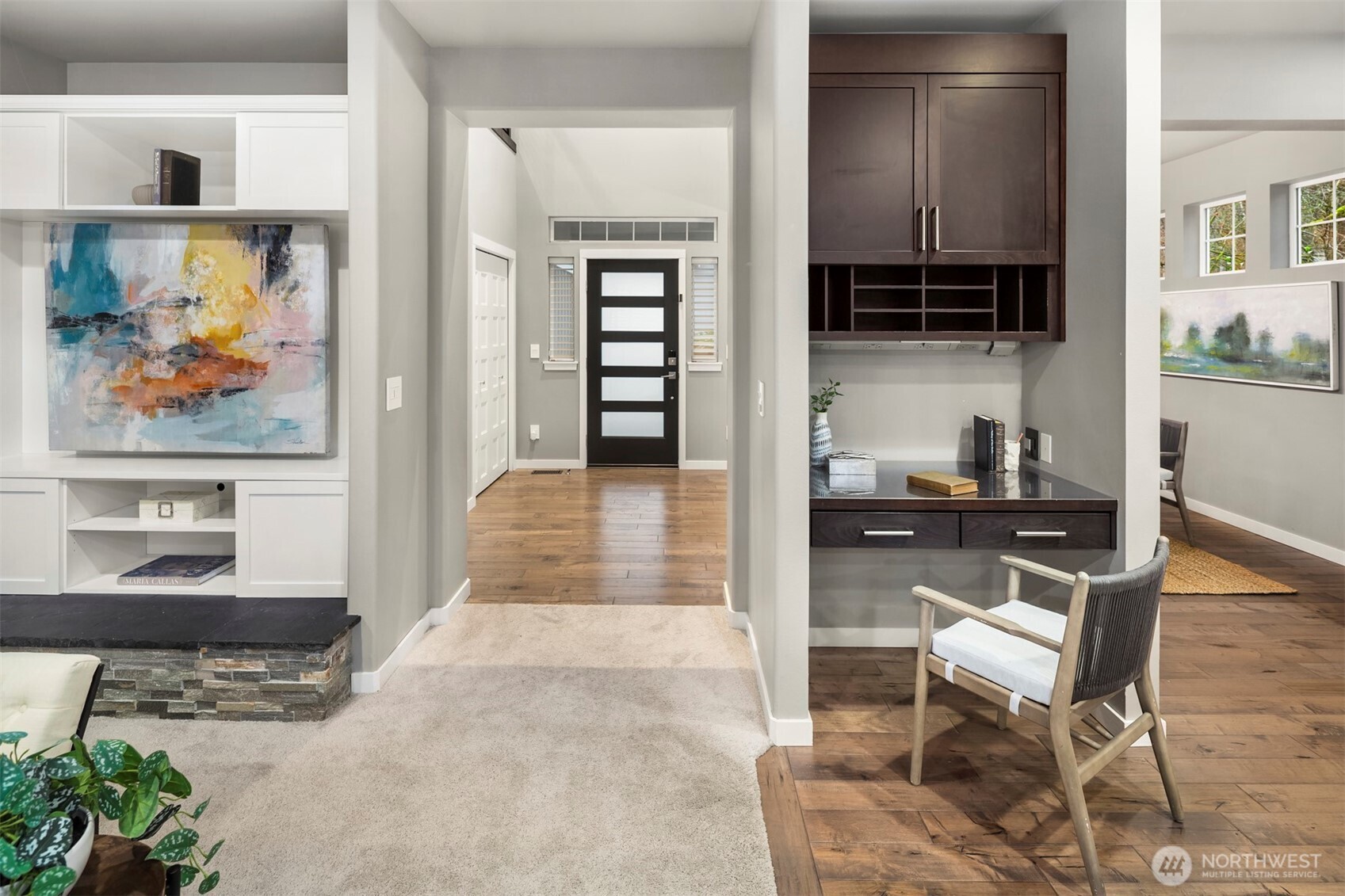 5819 Northeast 1st Street Renton, WA 98059 - Photo 8 of 38 a living room with furniture and a painting on the wall