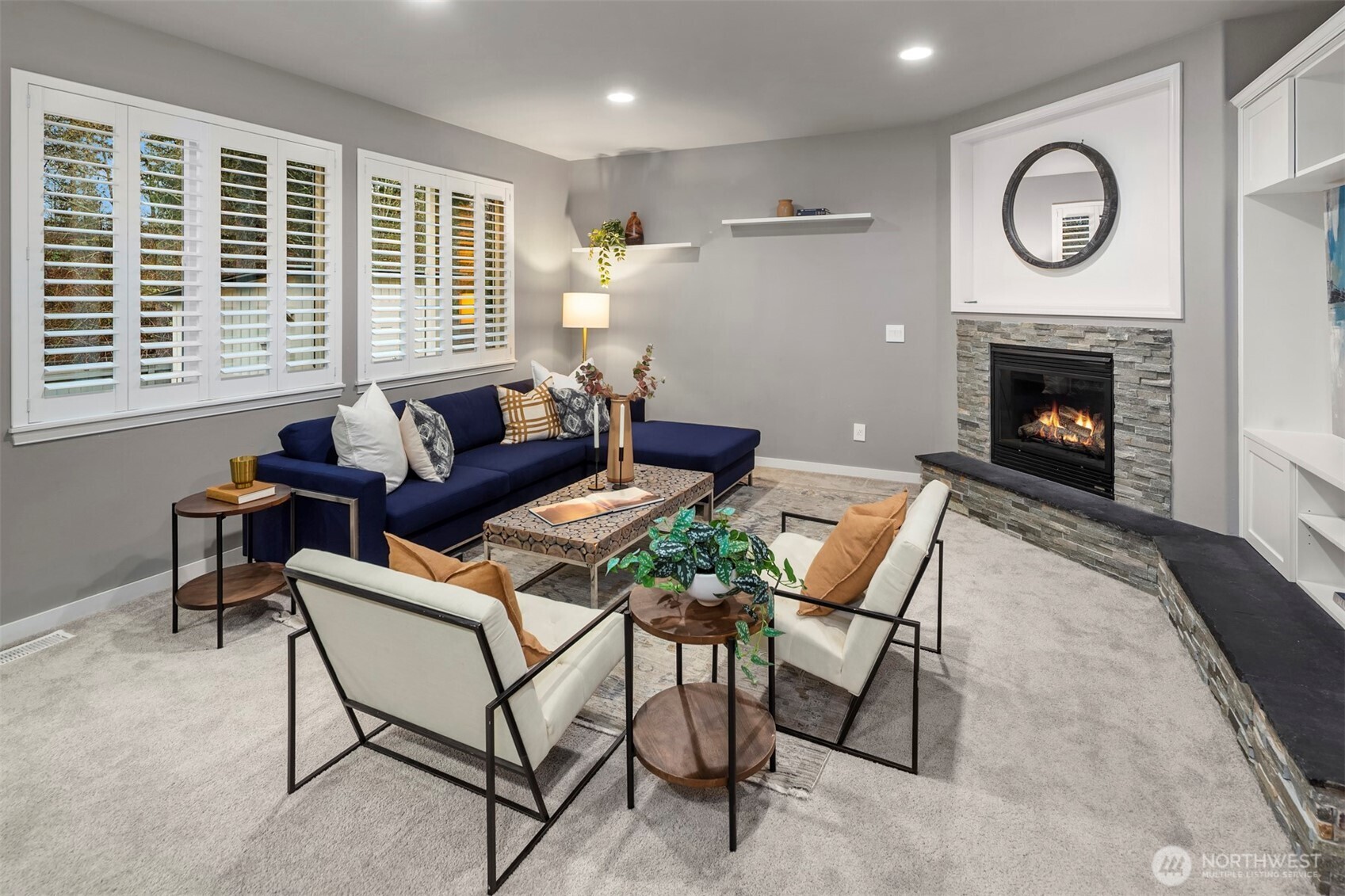 5819 Northeast 1st Street Renton, WA 98059 - Photo 10 of 38 a living room with furniture a fireplace and window