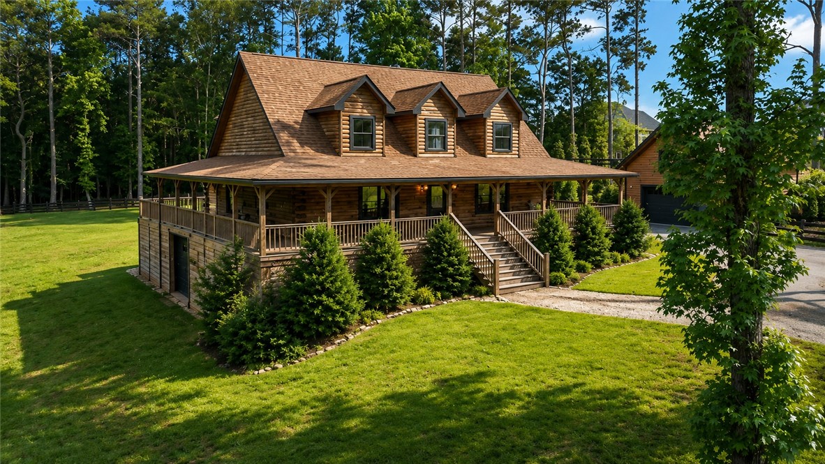 414 Devon Way Anderson, SC 29621 - Photo 41 of 50 A charming wood-clad home nestled among tall trees offers a welcoming front porch and extensive grounds.