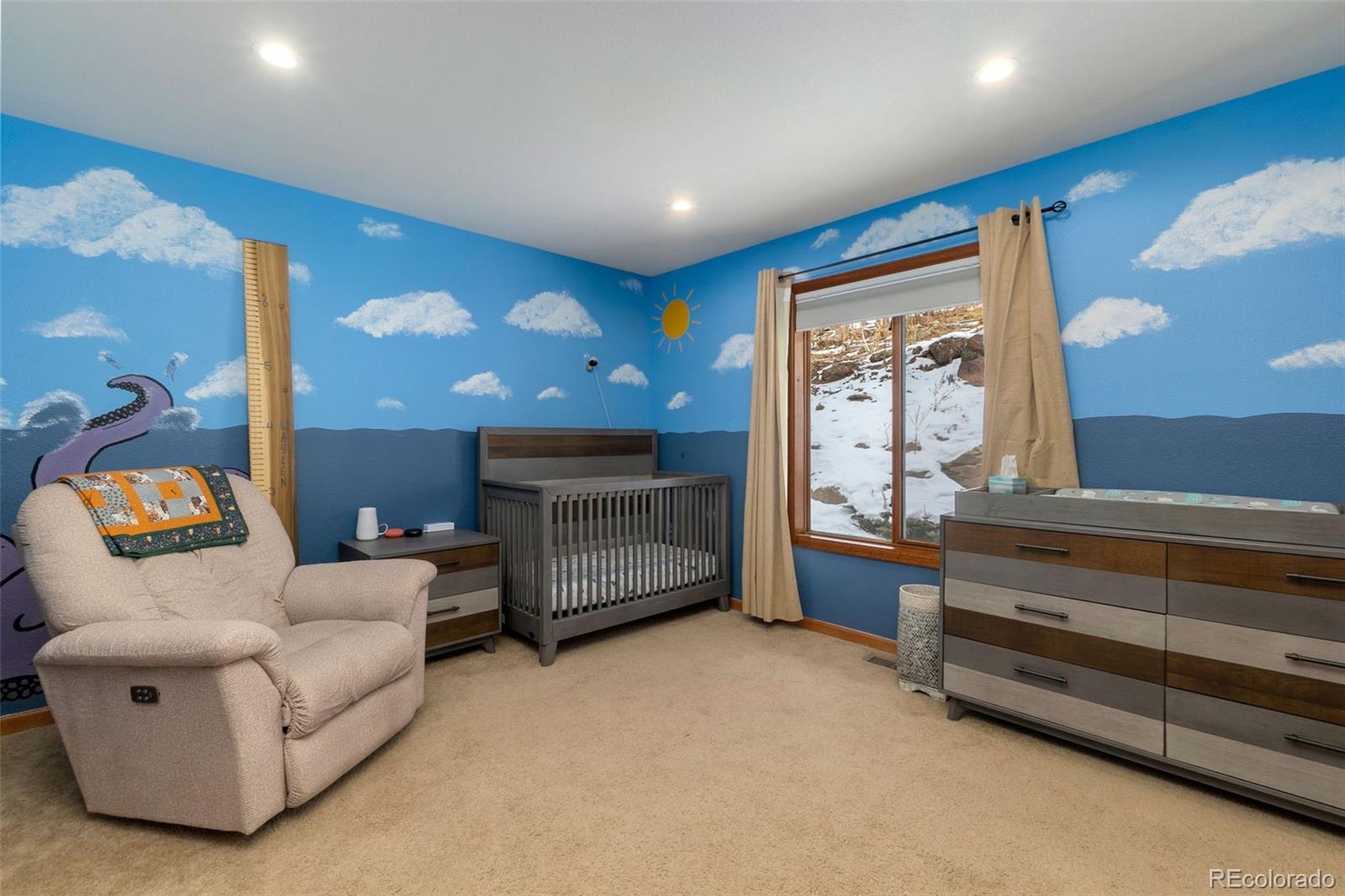33773 Elk Run Evergreen, CO 80439 - Photo 19 of 35 a living room with furniture and a window