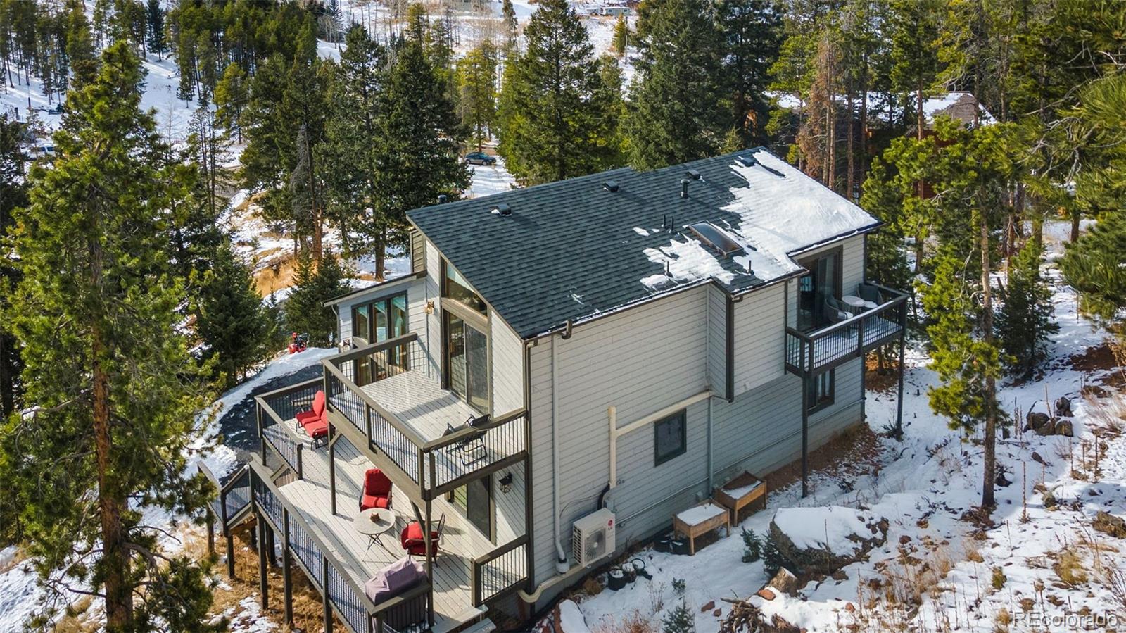 33773 Elk Run Evergreen, CO 80439 - Photo 33 of 35 an aerial view of a house with balcony and trees