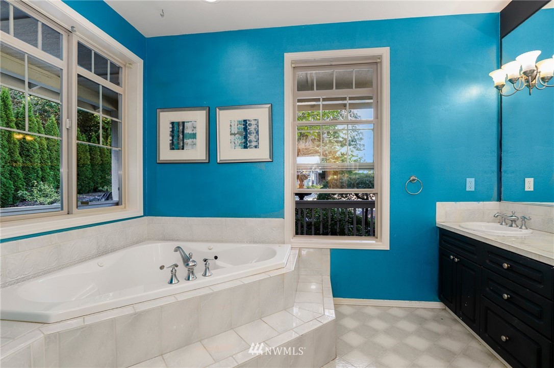 18318 Butler Road Snohomish, WA 98290 - Photo 14 of 25 a bathroom with a bathtub and a sink